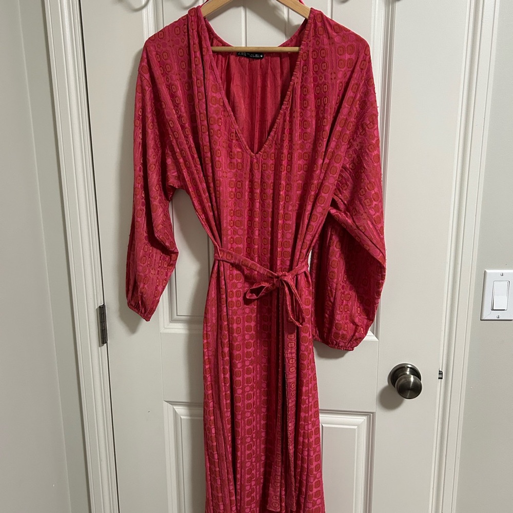 Zara Coral Pink long dress.  Deep v-neck, tie waist.
1
